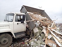 Вывоз мусора на газоне до 5кубов ,4.5тонны за раз,с утилизацией в Ярославле и области .